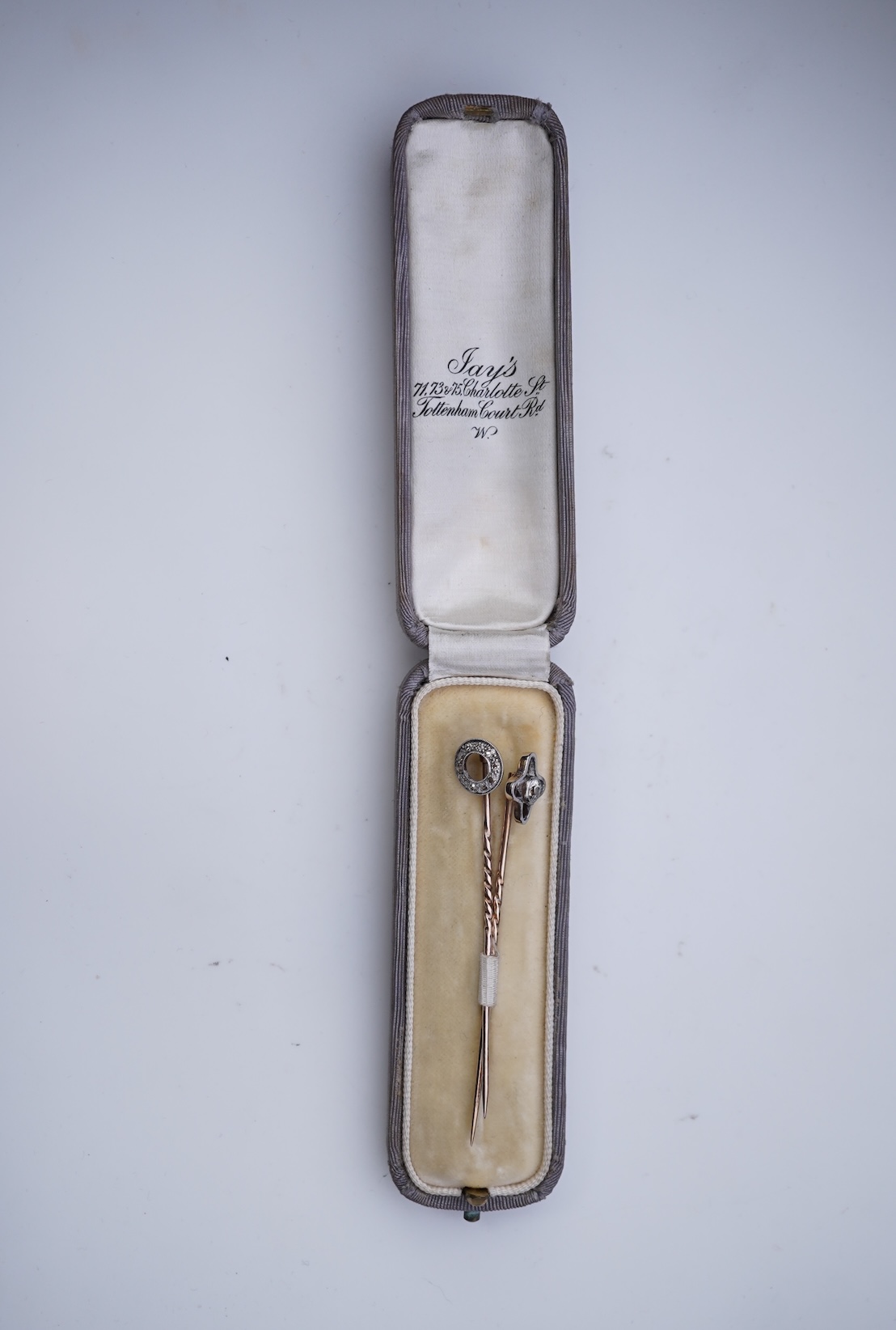 Two diamond stick pins, early 20th century